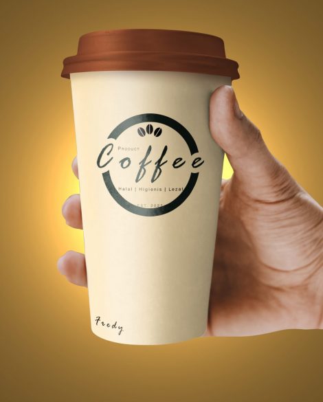 Free Hand Holding Paper Coffee Cup Mockup PSD